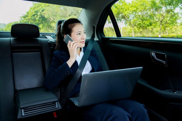 Executive Logan Airport limo service with professional chauffeur